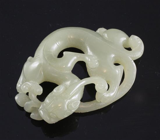 A Chinese celadon jade carving of a chi-dragon biting a sprig of lingzhi fungus, Qing dynasty, 6.9cm